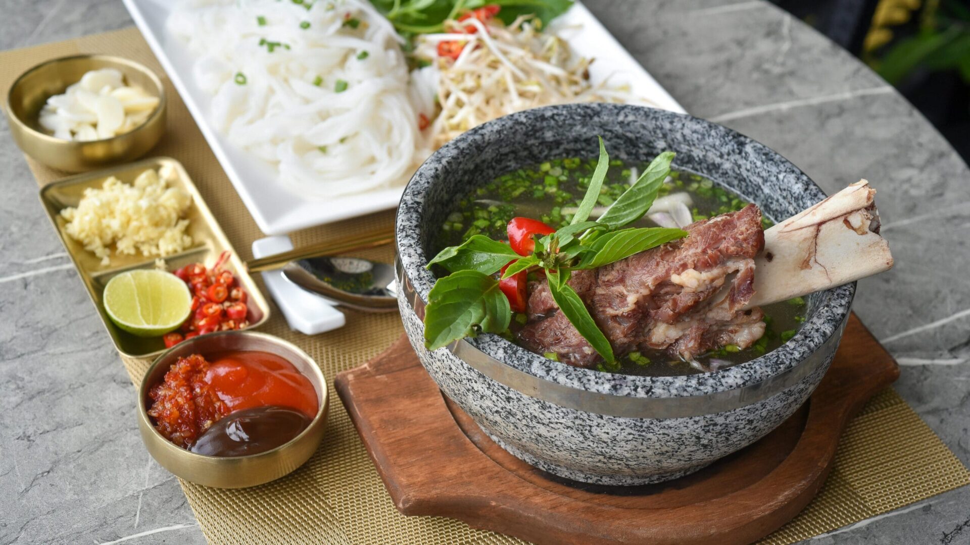 This image highlights a delicious soup made with beef soup bones, A hearty soup simmering with tender beef soup bones, fresh vegetables like carrots and celery, and flavorful herbs.