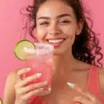 Pink Salt Trick: The Natural Morning Ritual That Helps Burn Fat Fast 3 A vibrant pink salt drink placed on a bathroom scale, styled with lime and a frosted rim, illustrating the Pink Salt Trick for weight loss. Pink background enhances the Pink Salt Trick theme, making the drink visually irresistible. Perfect representation of the Pink Salt Trick as a refreshing morning ritual.